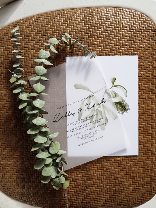 Banksia wedding invitation, using our hand painted banksia branch, in green watercolour it is the main feature of the invite and can be used as an art print, as text is printed onto a vellum paper