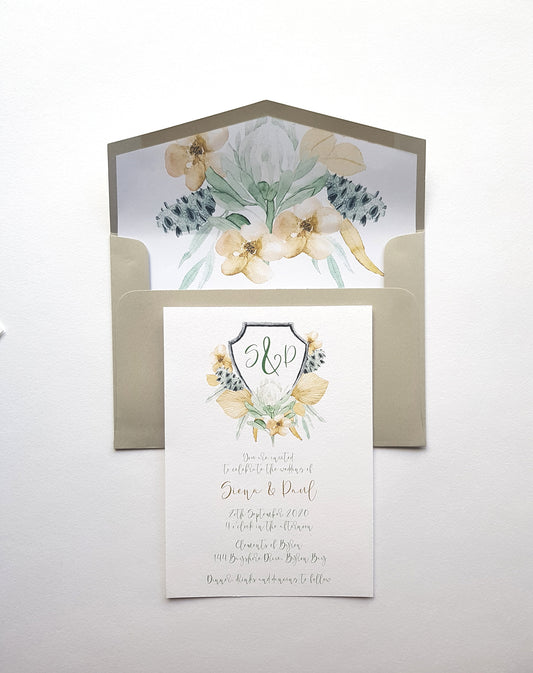 Crest botanical wedding invite design, featuring watercolour protea, banksia, flowers and gum leaves