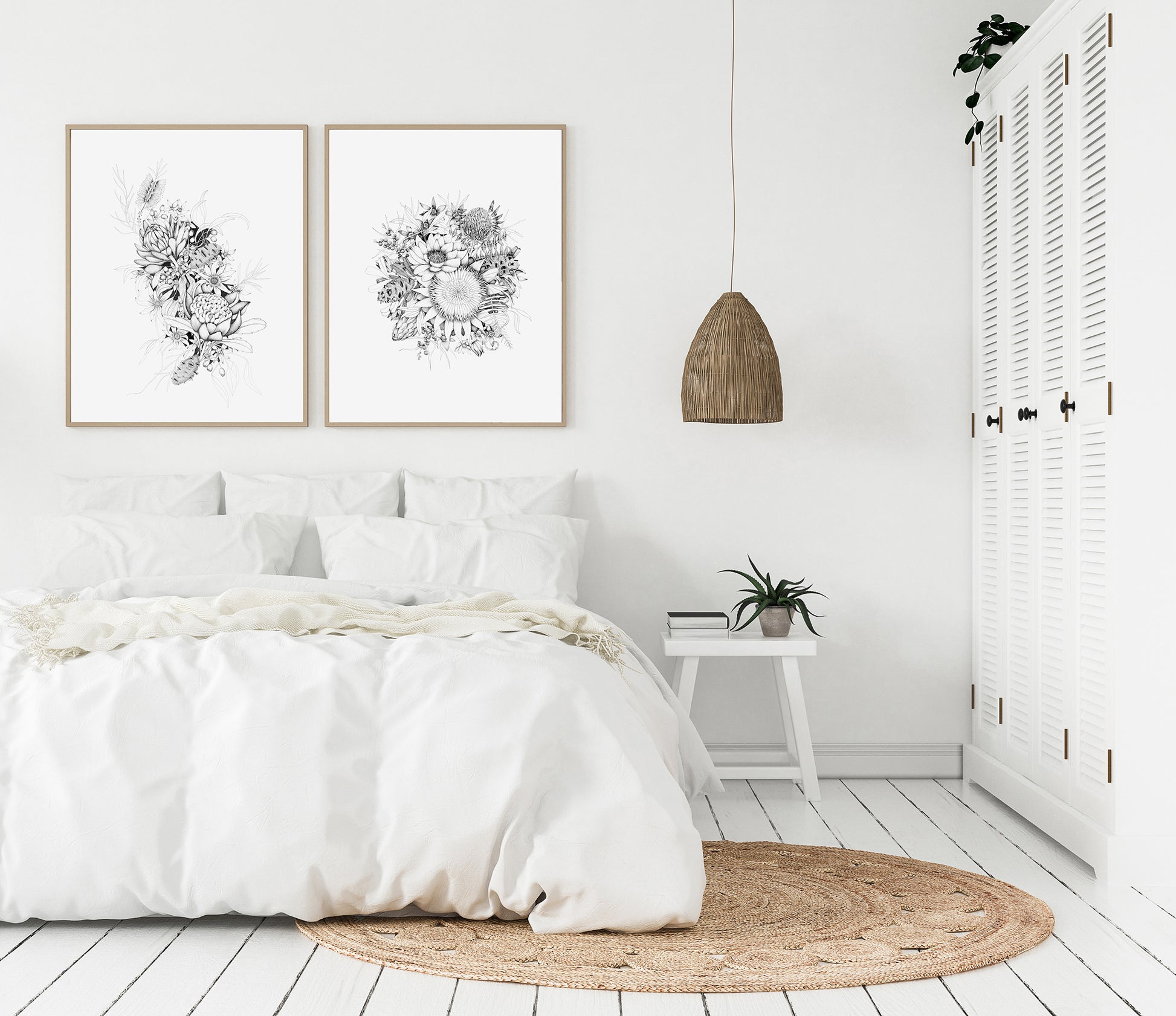 Set of art prints featuring botanical bunch line art drawings, with a light boho vibe set in a white minimal bedroom