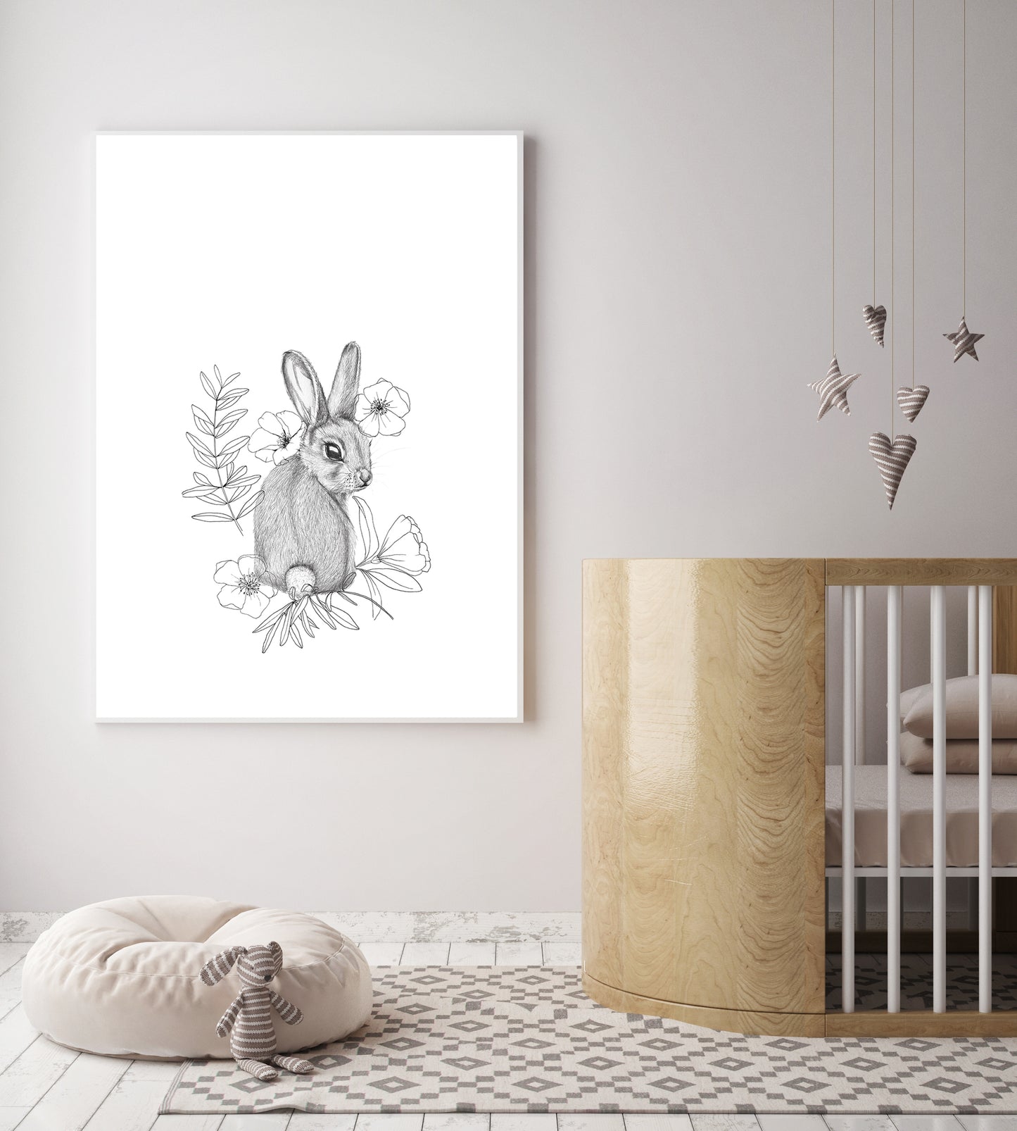 Bunny in sitting position turning around to look at you, drawn in pencil this black and white artwork suits a kids bedroom